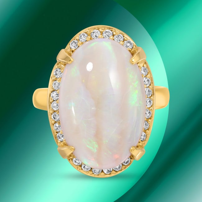 14k Gold 8.58ct Opal 0.34ct Diamond Ring: Retail: $9,837.00 ****** 14k Gold 8.58ct Opal 0.34ct Diamond Ring ****** Metal: 14k Solid Yellow Gold / Size: 7 / Total Item Weight: 9.0 grams / Country Made: USA / / Main Stone: Opal / Color: White /