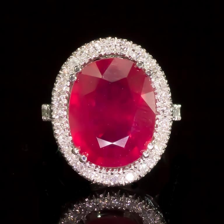 14k Gold 8.94ct Ruby 0.85ct Diamond Ring: Retail: $7,200.00****** 14K Gold Ruby & Diamond Ring ****** Metal: 14K Solid White Gold / Total Item Weight: 8.8 grams / Country Made: United States / / Main Stone: Ruby / Color: Red / Carat Total Wei
