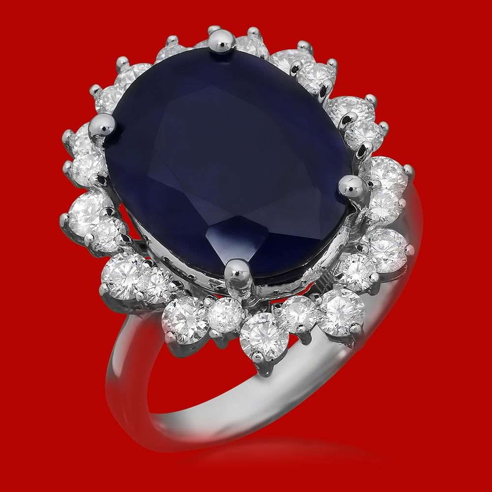 14k Gold 10.57ct Sapphire 1.77ct Diamond Ring: Retail: $8,700.00 ****** 14k Gold 10.57ct Sapphire 1.77ct Diamond Ring ****** Metal: 14k White Gold / Total Item Weight: 8.0 / Country Made: United States / / Main Stone: Sapphire / Color: Blue / Cara