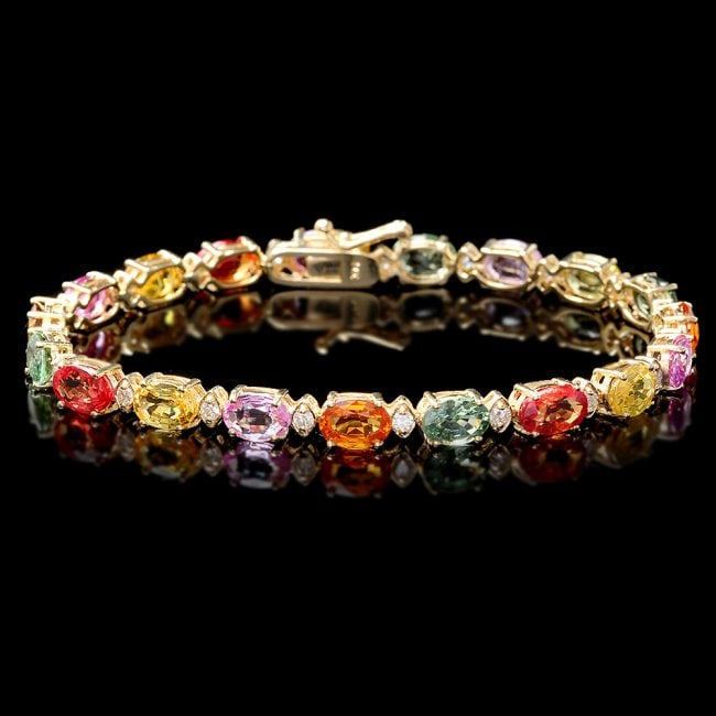 14k Gold 17ct Sapphire .70ct Diamond Bracelet: Retail: $14,320.00 ****** 14k Gold 17ct Sapphire .70ct Diamond Bracelet ****** Metal: 14k Solid Yellow Gold / Size: 7.5 / Total Item Weight: 11.5 grams / Country Made: United States / / Main Stone: Sa
