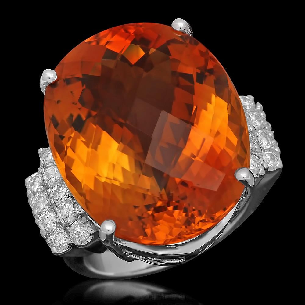 14K Gold 27.77ct Citrine 0.79ct Diamond Ring: Retail: $12,216.00 ****** 14K Gold 27.77ct Citrine 0.79ct Diamond Ring ****** Metal: 14K Solid Gold / Total Item Weight: 16.1 grams / Country Made: United States / / Main Stone: Citrine / Color: Orang