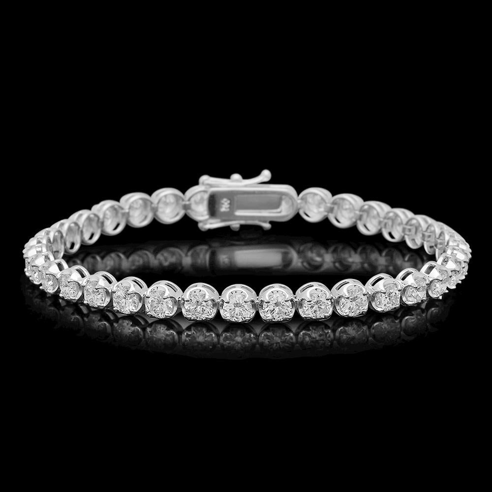 18K Gold 7.01ct Diamond Bracelet: Retail: $33,850.00 ****** 18K Gold 7.01ct Diamond Bracelet ****** Metal: 18K Solid Gold / Total Item Weight: 13.2 grams / Country Made: United States / / Main Stone: Diamond / Carat Total Weight: 7.01