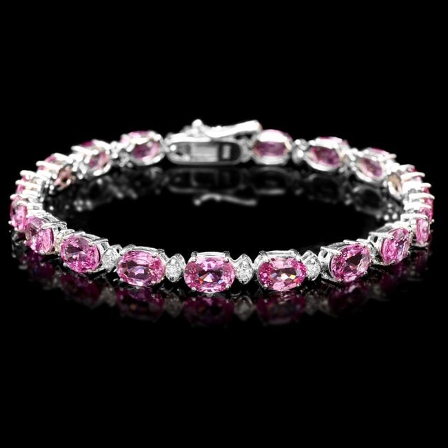 14k Gold 17ct Sapphire .75ct Diamond Bracelet: Retail: $23,600.00 ****** 14k Gold 17ct Sapphire .75ct Diamond Bracelet ****** Metal: 14k Solid White Gold / Size: 7 / Total Item Weight: 10.5 grams / Country Made: United States / / Main Stone: Sapph
