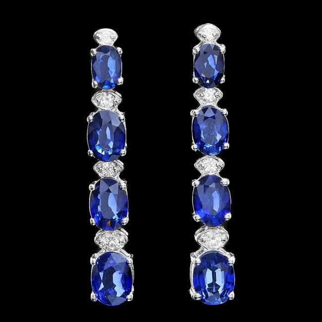 14k Gold 7ct Sapphire 0.33ct Diamond Earrings: Retail: $5,600.00 ****** 14k Gold 7ct Sapphire 0.33ct Diamond Earrings ****** Metal: 14k Solid White Gold / Total Item Weight: 5.0 grams / Country Made: United States / / Main Stone: Sapphire / Color:
