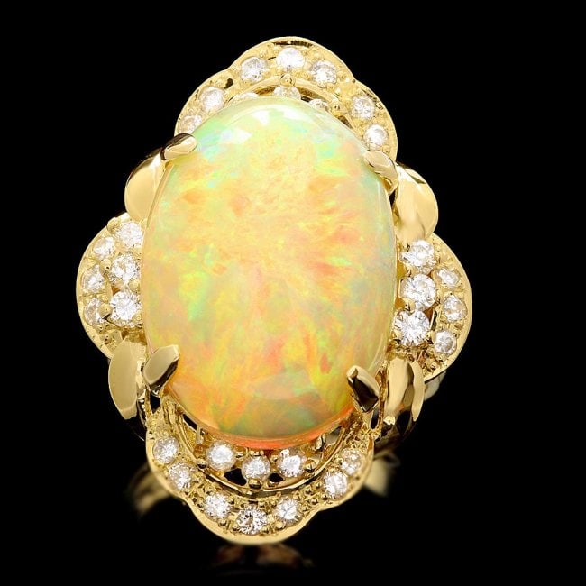 18k Yellow Gold 11.00ct Opal 0.80ct Diamond Ring: Retail: $14,850.00 ****** 18k Yellow Gold 11.00ct Opal 0.80ct Diamond Ring ****** Metal: 18k Solid Yellow Gold / Size: 7.25 / Total Item Weight: 11.5 grams / Country Made: United States / / Main Stone
