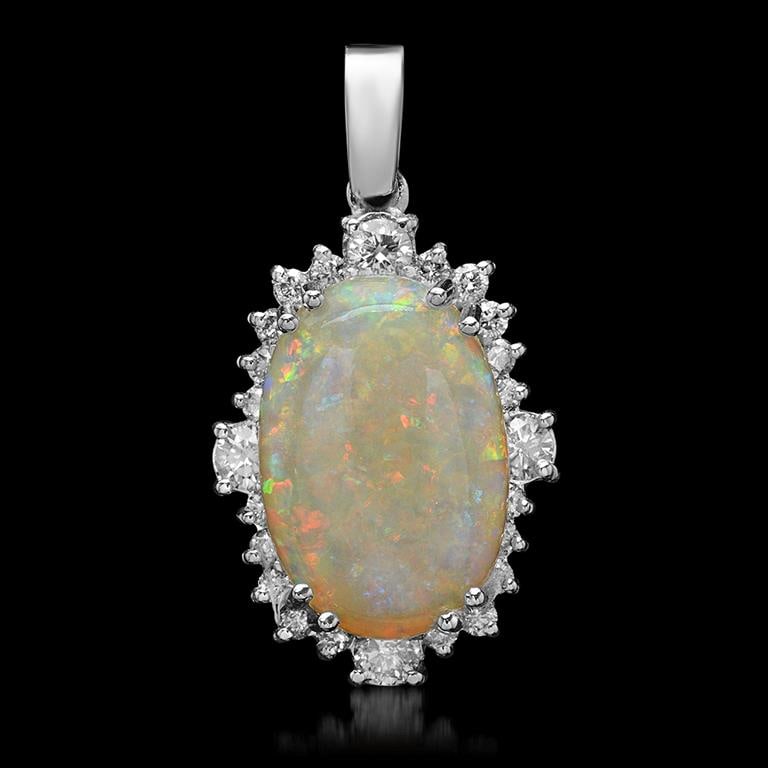 14K Gold 5.87ct Opal 1.11ct Diamond Pendant: Retail: $9,953.00******14K Gold Opal & Diamond Pendant ****** Metal: 14K Solid White Gold / Total Item Weight: 6.4 grams / Country Made: United States / / Main Stone: Opal / Color: White / Carat Total