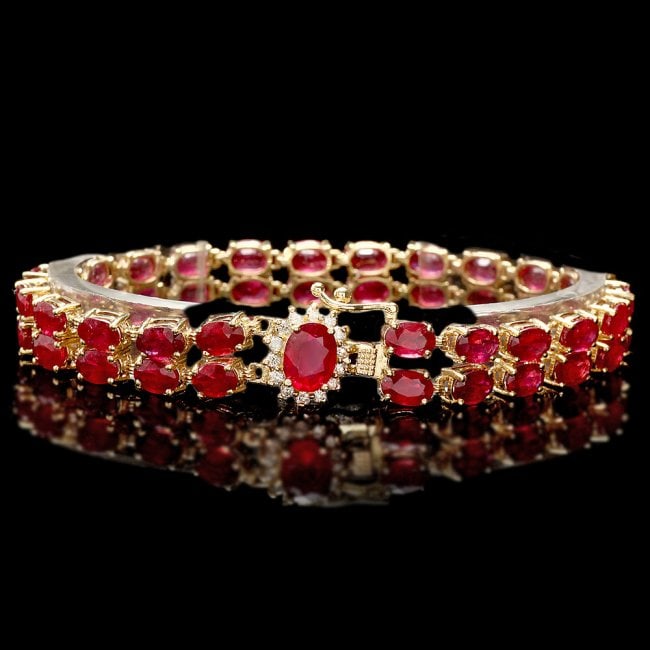 14k Yellow Gold 31ct Ruby 0.30ct Diamond Bracelet: Retail: $16,750.00 ****** 14k Yellow Gold 31ct Ruby 0.30ct Diamond Bracelet ****** Metal: 14k Solid Yellow Gold / Size: 7 / Total Item Weight: 20.0 grams / Country Made: United States / / Main Stone: 