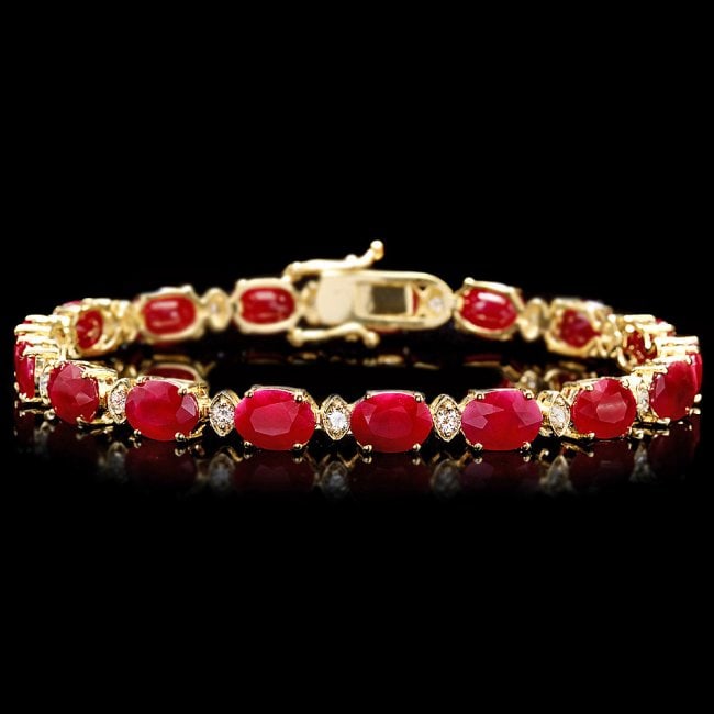 14k Gold 25.00ct Ruby 1.00ct Diamond Bracelet: Retail: $18,200.00 ****** 14k Gold 25.00ct Ruby 1.00ct Diamond Bracelet ****** Metal: 14k Solid Yellow Gold / Size: 7.5 / Total Item Weight: 16.5 grams / Country Made: United States / / Main Stone: Ru