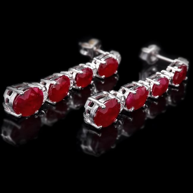 14k Gold 7.00ct Ruby 0.30ct Diamond Earrings: Retail: $5,300.00 ****** 14k Gold 7.00ct Ruby 0.30ct Diamond Earrings ****** Metal: 14k Solid White Gold / Total Item Weight: 4.5 grams / Country Made: United States / / Main Stone: Ruby / Color: Red 