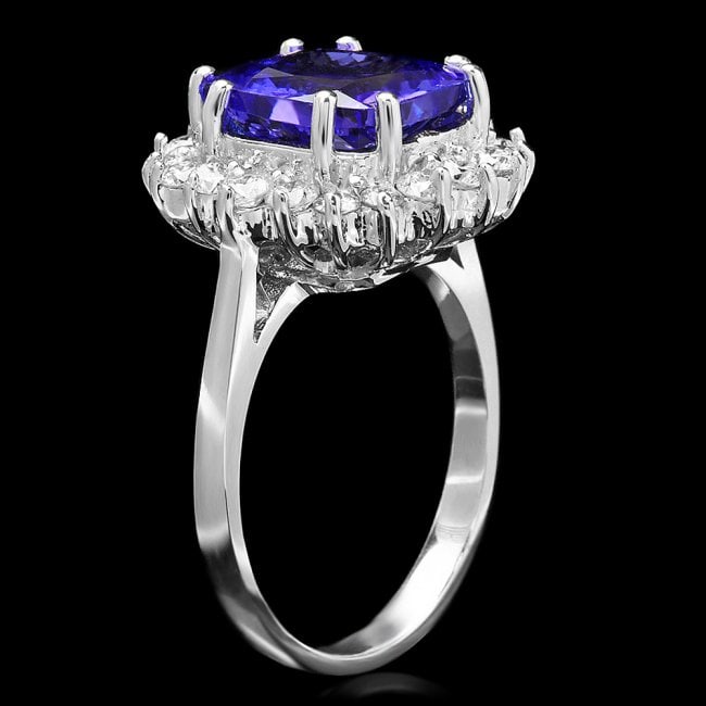 14k Gold 4.00ct Tanzanite 0.90ct Diamond Ring: Retail: $11,850.00 ****** 14k Gold 4.00ct Tanzanite 0.90ct Diamond Ring ****** Metal: 14k Solid White Gold / Size: 7 / Total Item Weight: 5.5 grams / Country Made: United States / / Main Stone: Tanzan