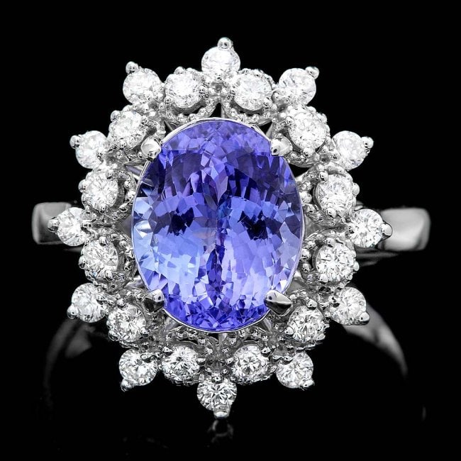 14k Gold 3.00ct Tanzanite 0.60ct Diamond Ring: Retail: $9,850.00 ****** 14k Gold 3.00ct Tanzanite 0.60ct Diamond Ring ****** Metal: 14k Solid White Gold / Size: 7 / Total Item Weight: 4.0 grams / Country Made: United States / / Main Stone: Tanzani