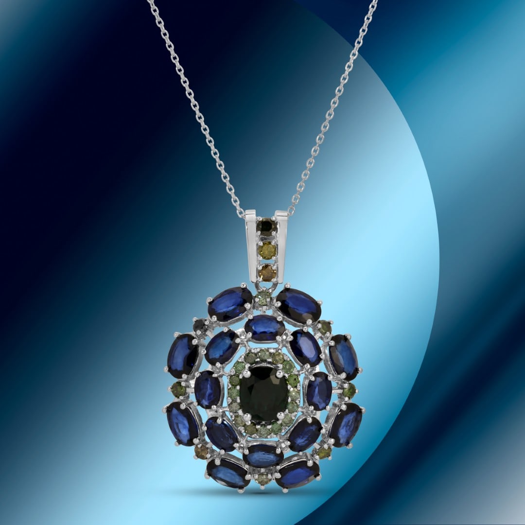14K Gold 10.93cts Sapphire & 1.28cts Diamond Pendant: Retail: $13,642*****14K Gold Sapphire & Diamond Pendant*****Metal: 14K White Gold/ Total Wt.: 10.6g / Country Made US// Main Stone: Sapphire / Carat Total Wt.: 10.93cts / Treatment: Diffusion / Color: