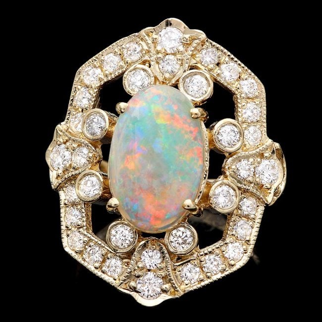 14k Yellow Gold 2.50ct Opal 1.25ct Diamond Ring: Retail: $13,250.00 ****** 14k Yellow Gold 2.50ct Opal 1.25ct Diamond Ring ****** Metal: 14k Solid Yellow Gold / Size: 7.5 / Total Item Weight: 8.0 grams / Country Made: United States / / Main Stone: O