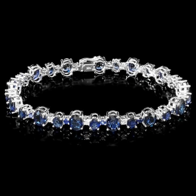 14k Gold 26ct Sapphire 1.00ct Diamond Bracelet: Retail: $18,300.00 ****** 14k Gold 26ct Sapphire 1.00ct Diamond Bracelet ****** Metal: 14k Solid White Gold / Size: 8.5 / Total Item Weight: 22 grams / Country Made: United States / / Main Stone: Sapp