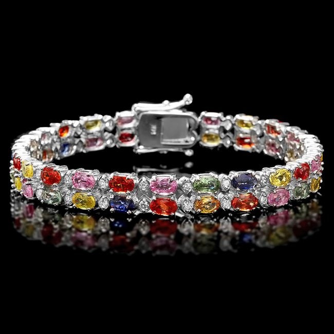 14k Gold 15.00ct Sapphire 1.10ct Diamond Bracelet: Retail: $11,400.00 ****** 14k Gold 15.00ct Sapphire 1.10ct Diamond Bracelet ****** Metal: 14k Solid White Gold / Size: 7 / Total Item Weight: 18 grams / Country Made: United States / / Main Stone: Sap