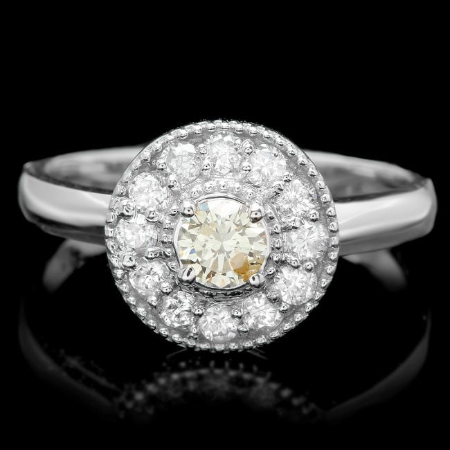 14k White Gold .67ct Diamond Ring: Retail: $6,350.00 ****** 14k White Gold .67ct Diamond Ring ****** Metal: 14k Solid White Gold / Total Item Weight: 3.5 grams / Country Made: United States / / Main Stone: Diamond / Color: Yellow / Car