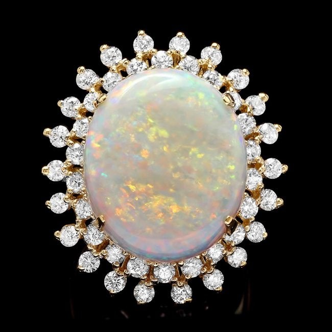 14k White Gold 13.00ct Opal 1.80ct Diamond Ring: Retail: $12,800.00******* 14k White Gold 13.00ct Opal 180ct Diamond Ring ****** Metal: 14k Solid Gold / Size: 7 / Total Item Weight: 10.5 grams / Country Made: USA / / Main Stone: Opal/ Color: Multi-C
