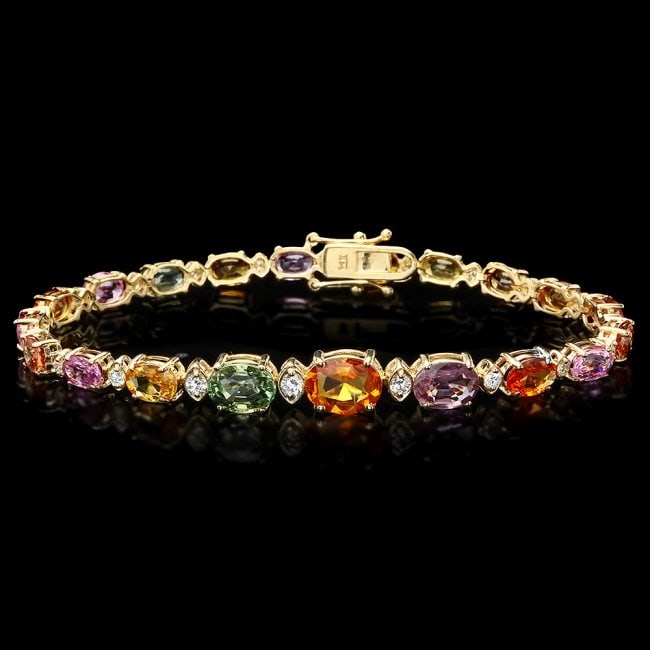 14k Gold 15.79ct Sapphire 0.74ct Diamond Bracelet: Retail: $9,350.00 ****** 14k Gold 15.79ct Sapphire 0.74ct Diamond Bracelet ****** Metal: 14k Solid Yellow Gold / Size: 7.5 / Total Item Weight: 11.4 grams / Country Made: United States / / Main Stone: