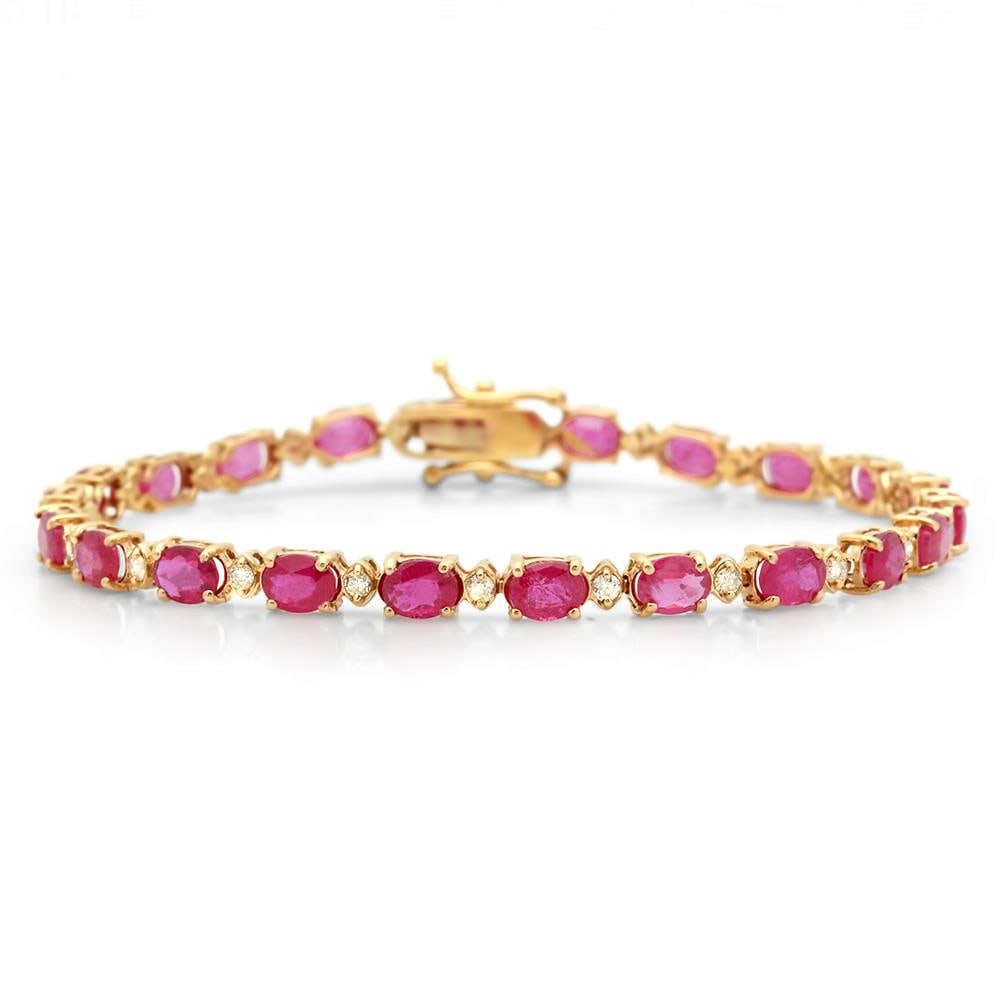14K Gold 9.65ct Ruby 0.70cts Diamond Bracelet: Retail: $6,590.00 ****** 14K Gold 9.65ct Ruby 0.70cts Diamond Bracelet ****** Metal: 14K Yellow Gold / Total Item Weight: 8.9 grams / Country Made: United States / Main Stone: Ruby / Color: Red / Cara