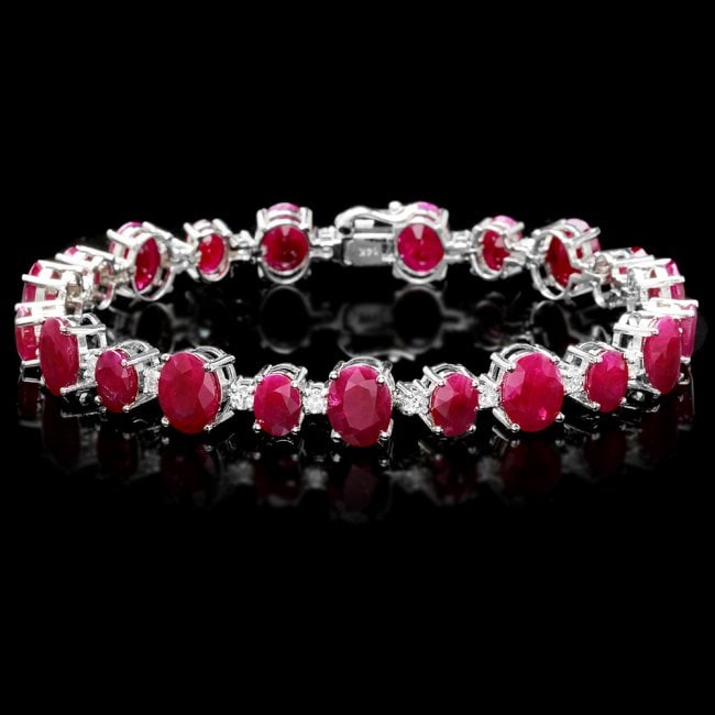 14k Gold 40.00ct Ruby 1.50ct Diamond Bracelet: Retail: $21,850.00 ****** 14k Gold 40.00ct Ruby 1.50ct Diamond Bracelet ****** Metal: 14k Solid White Gold / Size: 8 / Total Item Weight: 23.5 grams / Country Made: United States / / Main Stone: Ruby 