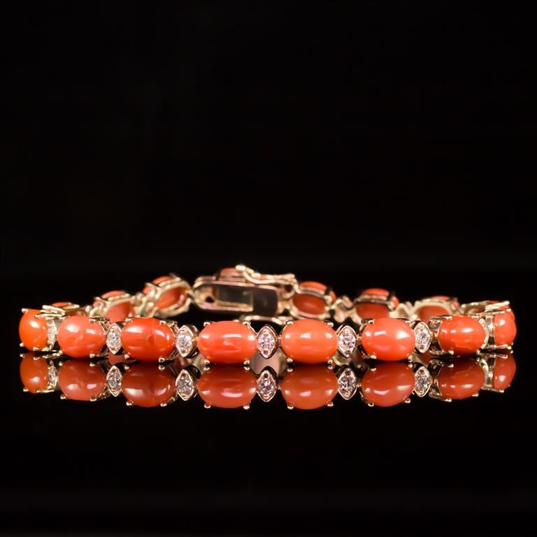 14K Gold 15.68ct Coral 0.80ct Diamond Bracelet: Retail: $12,790.00******14K Gold Coral & Diamond Bracelet ****** Metal: 14K Solid Gold / Total Item Weight: 14.2 grams / Country Made: United States / / Main Stone: Natural Coral / Color: Reddish Oran