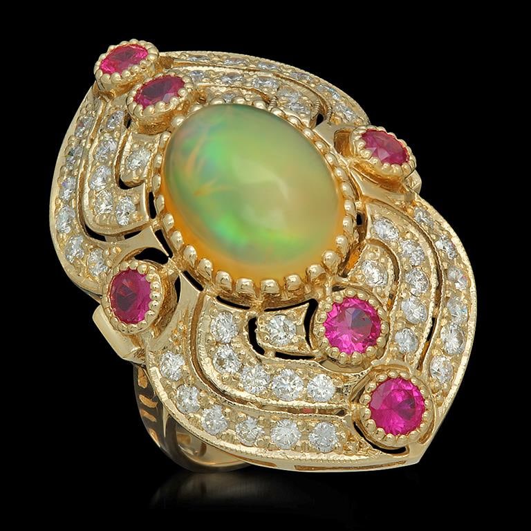 14K Gold 3.60ct Opal, 1.20ct Ruby & 1.51ct Diamond Ring: Retail: $10,952.00 ****** Opal, Ruby & Diamond Ring ****** Metal: 14K Solid Yellow Gold / Total Item Weight: 10.9 / Country Made: United States / / Main Stone: Opal / Color: Play of Color / Carat Tota