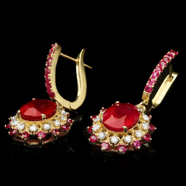 14k Gold 9.4ct Ruby 0.60ct Diamond Earrings: Retail: $7,800.00 ****** 14k Gold 9.4ct Ruby 0.60ct Diamond Earrings ****** Metal: 14k Solid Yellow Gold / Total Item Weight: 8.0 grams / Country Made: United States / / Main Stone: Ruby / Color: Red 