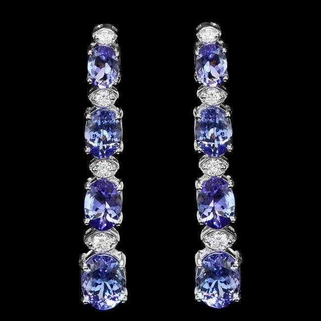 14k Gold 6.00ct Tanzanite 0.45ct Diamond Earrings: Retail: $6,900.00 ****** 14k Gold 6.00ct Tanzanite 0.45ct Diamond Earrings ****** Metal: 14k Solid White Gold / Total Item Weight: 5 grams / Country Made: United States / / Main Stone: Tanzanite / Col