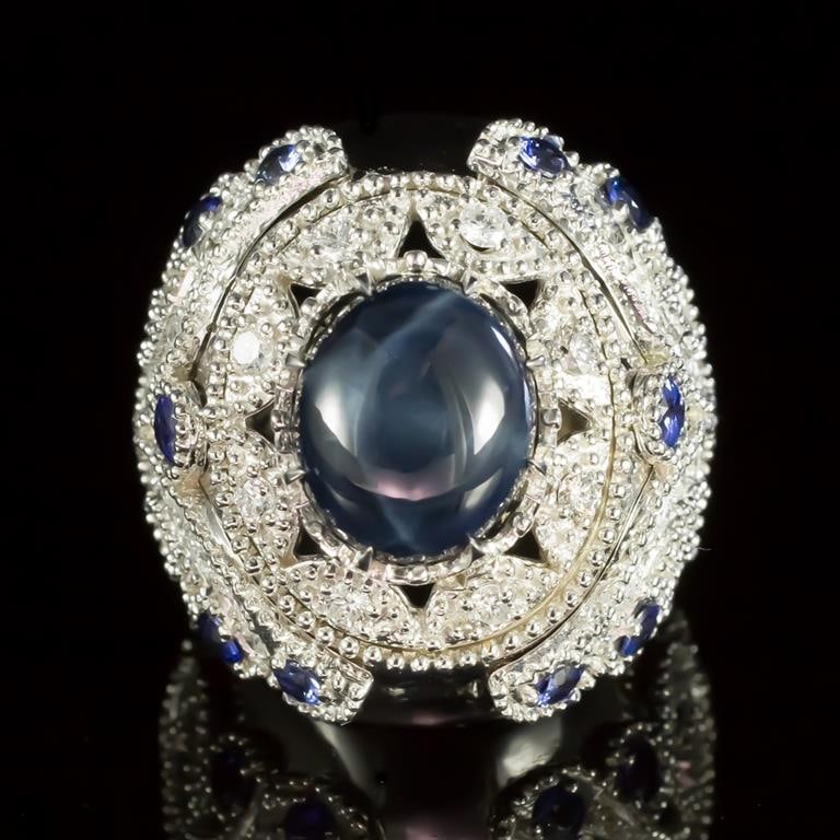 14K Gold 11.61ct Star Sapphire, 1.38ct Sapphire 1.55ct Diamond Ring: Retail: $13,430.00 ******Star Sapphire, Sapphire & Diamond Ring ****** Metal: 14K Solid White Gold / Total Item Weight: 19.9 grams / Country Made: United States / / Main Stone: Star Sapphire / Color: 