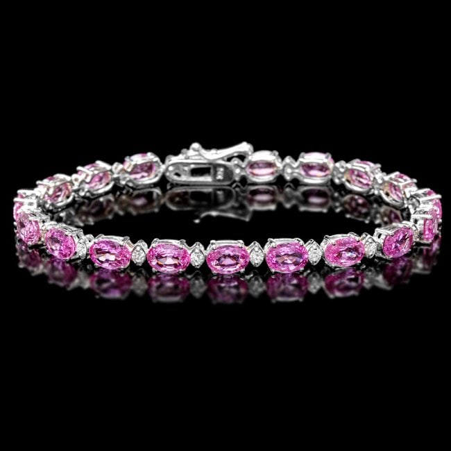14k Gold 16ct Sapphire .70ct Diamond Bracelet: Retail: $22,650.00 ****** 14k Gold 16ct Sapphire .70ct Diamond Bracelet ****** Metal: 14k Solid White Gold / Size: 7 / Total Item Weight: 11.0 grams / Country Made: United States / / Main Stone: Sapph