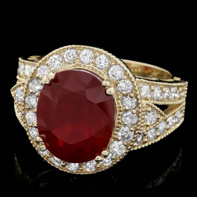 14k Yellow Gold 8.00ct Ruby 1.40ct Diamond Ring: Retail: $8,800.00 ****** 14k Yellow Gold 8.00ct Ruby 1.40ct Diamond Ring ****** Metal: 14k Solid Yellow Gold / Total Item Weight: 8.5 grams / Country Made: United States / / Main Stone: Ruby / Color: 
