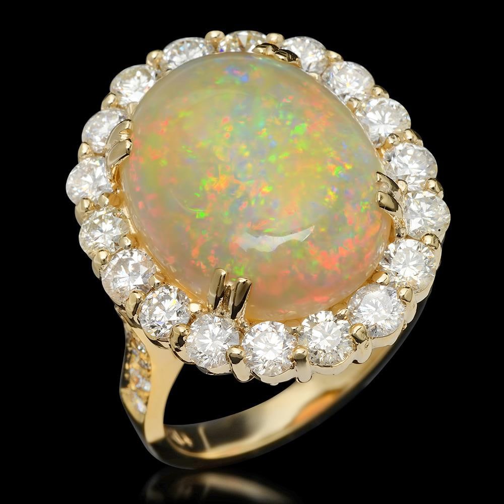 14K Gold 8.38ct Opal & 2.60ct Diamond Ring: Retail: $16,610.00****** 14K Gold Opal & Diamond Ring ****** Metal: 14K Solid Gold / Total Item Weight: 10.2 grams / Country Made: United States / / Main Stone: Opal / Color: Play of Color / Carat Tot