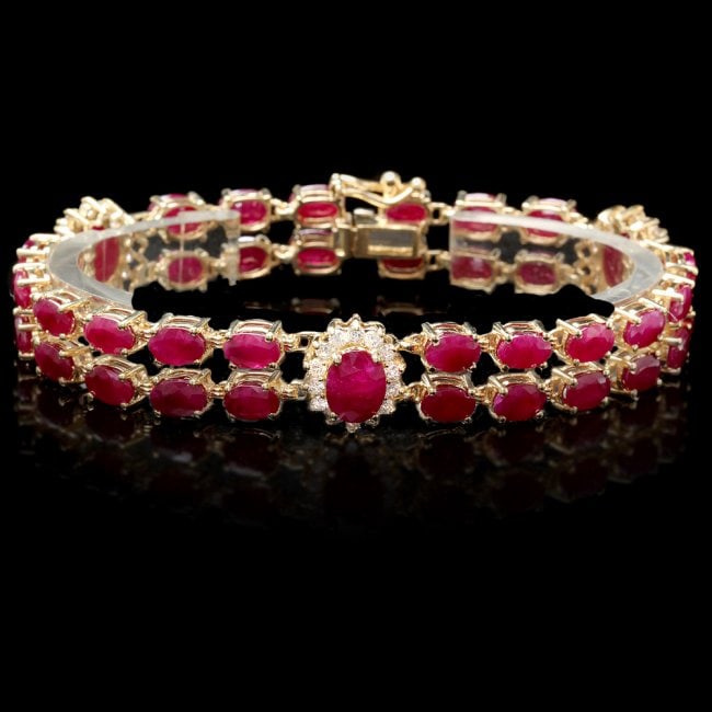 14k Yellow Gold 26ct Ruby 1.25ct Diamond Bracelet: Retail: $20,860.00 ****** 14k Yellow Gold 26ct Ruby 1.25ct Diamond Bracelet ****** Metal: 14k Solid Yellow Gold / Size: 7 / Total Item Weight: 20.5 grams / Country Made: United States / / Main Stone: 