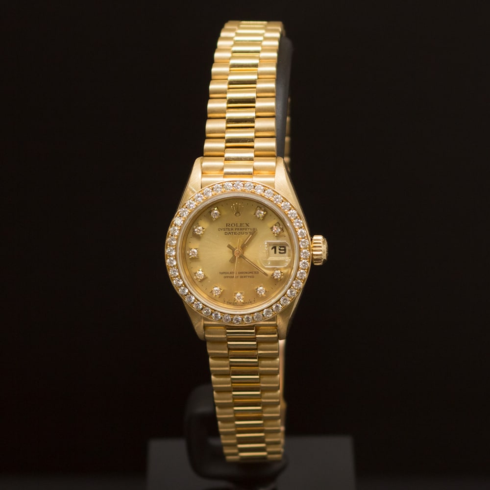 Rolex 18K Gold Presidential 26mm Diamond Dial Diamond Bezel Women's Wristwatch: ****** Rolex 18K Gold Presidential 26mm Diamond Dial Diamond Bezel Women's Wristwatch ****** One Women's, Rolex 18K Gold Presidential 26mm electronically tested and polished. Case: Gold, 26mm. Bezel: 