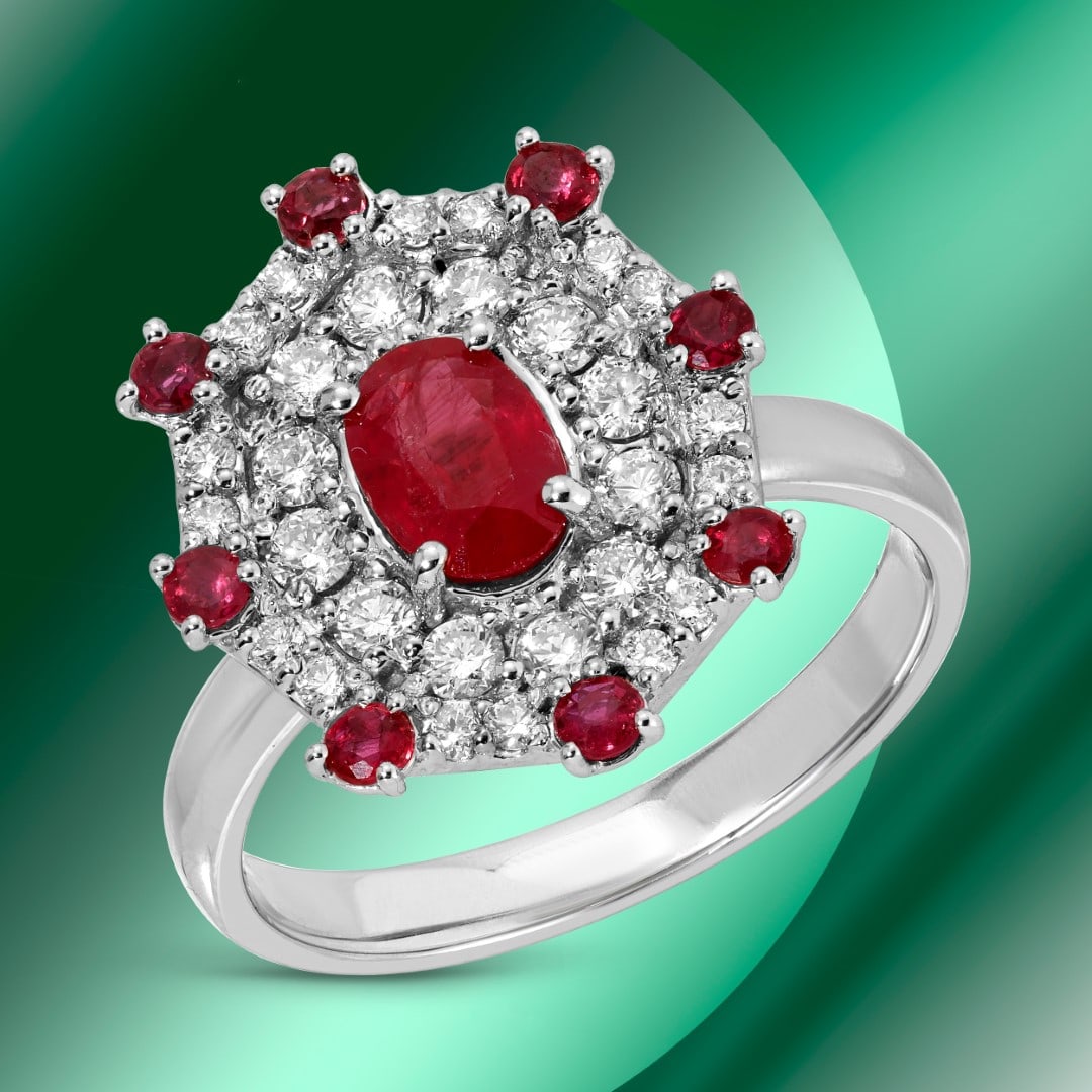 14k Gold 1.13ctc Ruby & 0.56ctc Diamond Ring: Retail: $7,542*****14K Gold Ruby & Diamond Ring*****Metal: 14K White Gold/ Total Wt.:5.6g / Country Made US// Main Stone: Ruby / Carat Total Wt.: 1.13cts / Treatment: None / Color: Red / Cut: Very Cut