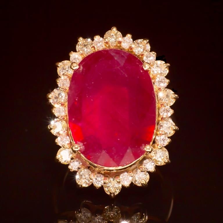 14K Gold 14.81ct Ruby 2.10ct Diamond Ring: Retail: $11,778.00 ******18K Gold Ruby & Diamond Ring ****** Metal: 14K Solid Gold / Total Item Weight: 11.7 grams / Country Made: United States / / Main Stone: Ruby / Color: Red/ Carat Total Weight: 