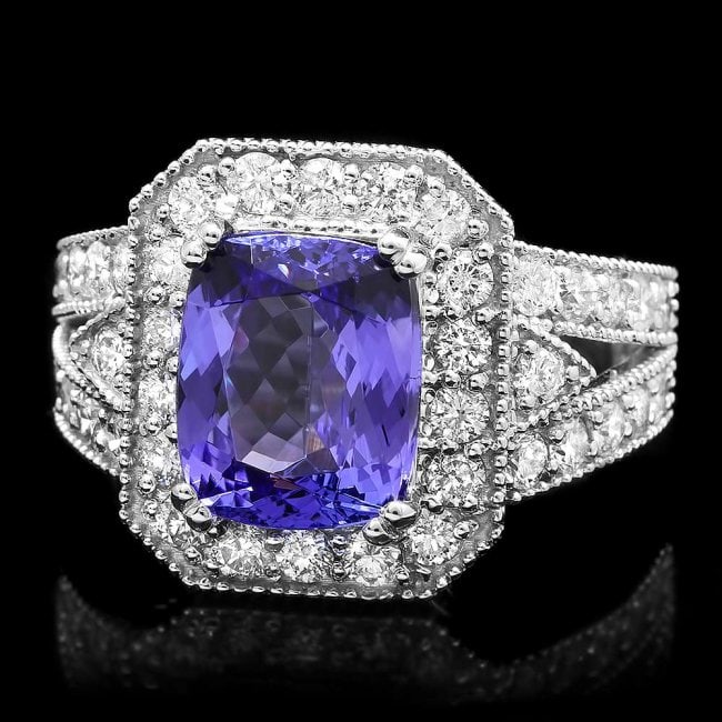 14k Gold 4.00ct Tanzanite 1.50ct Diamond Ring: Retail: $12,650.00 ****** 14k Gold 4.00ct Tanzanite 1.50ct Diamond Ring ****** Metal: 14k Solid White Gold / Size: 7.25 / Total Item Weight: 8.2 grams / Country Made: United States / / Main Stone: Tan