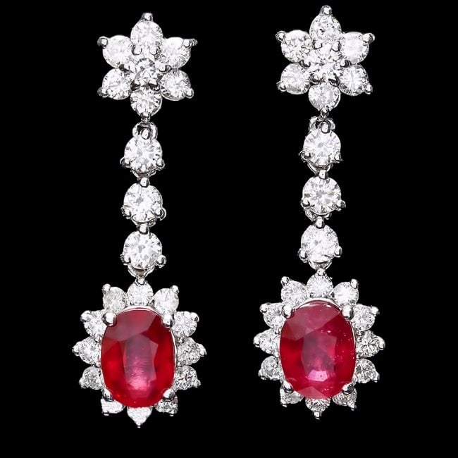 14k Gold 4.00ct Ruby 2.50ct Diamond Earrings: Retail: $13,100.00 ****** 14k Gold 4.00ct Ruby 2.50ct Diamond Earrings ****** Metal: 14k Solid White Gold / Total Item Weight: 5.5 grams / Country Made: United States / / Main Stone: Ruby / Color: Red