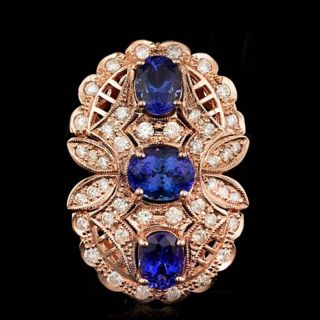 14k Rose 5.50ct Tanzanite 1.60ct Diamond Ring: Retail: $13,500.00 ****** 14k Rose 5.50ct Tanzanite 1.60ct Diamond Ring ****** Metal: 14k Solid Rose Gold / Size: 7 / Total Item Weight: 13.5 grams / Country Made: United States / / Main Stone: Tanzan