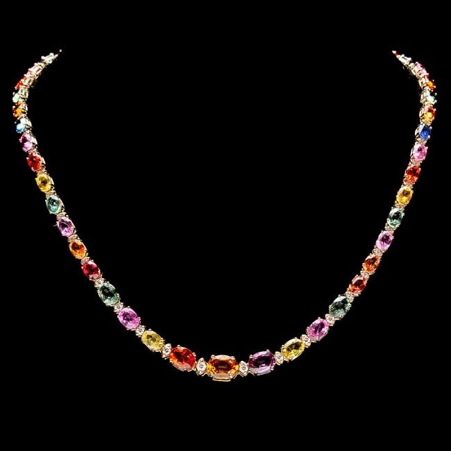 14k Gold 33ct Sapphire 1.2ct Diamond Necklace: Retail: $21,300.00 ****** 14k Gold 33ct Sapphire 1.2ct Diamond Necklace ****** Metal: 14k Solid Yellow Gold / Size: 16.5 / Total Item Weight: 22.5 grams / Country Made: United States / / Main Stone: S