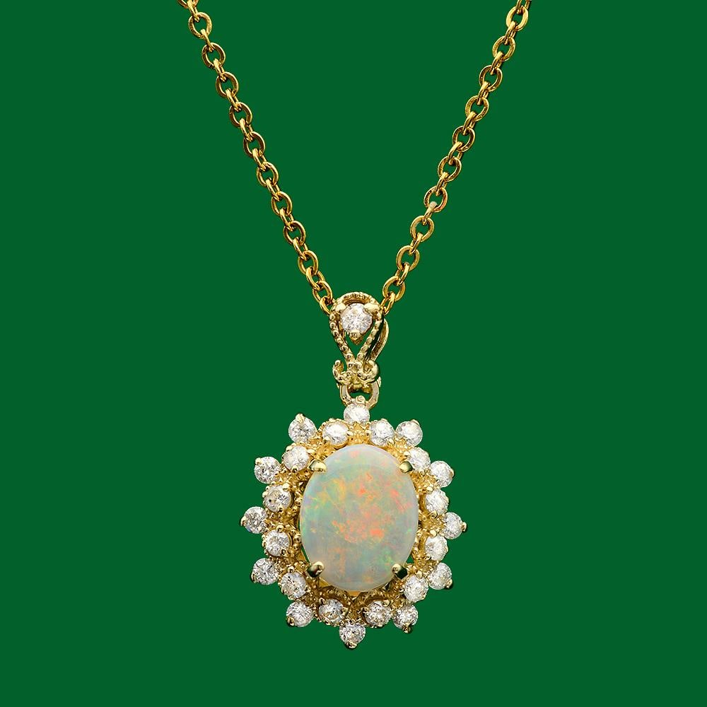 14k Gold 1.01ct Opal 0.70ct Diamond Pendant: Retail: $3,400.00 ****** 14k Gold 1.01ct Opal 0.70ct Diamond Pendant****** Metal: 14k Solid Yellow Gold / Total Item Weight: 2.7 grams / Country Made: United States / / Main Stone: Opal / Color: Play 