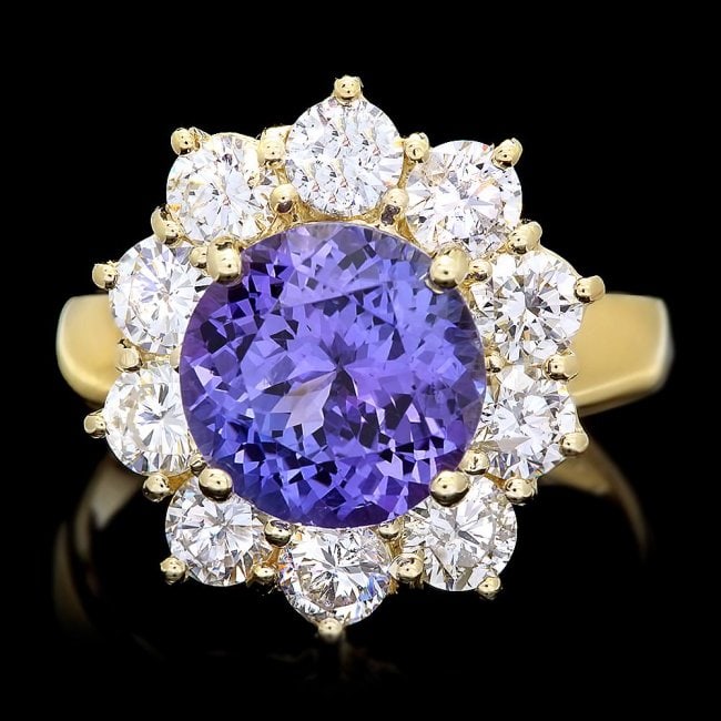 14k Gold 3.00ct Tanzanite 1.70ct Diamond Ring: Retail: $14,200.00 ****** 14k Gold 3.00ct Tanzanite 1.70ct Diamond Ring ****** Metal: 14k Solid Yellow Gold / Size: 7 / Total Item Weight: 6.0 grams / Country Made: United States / / Main Stone: Tanza