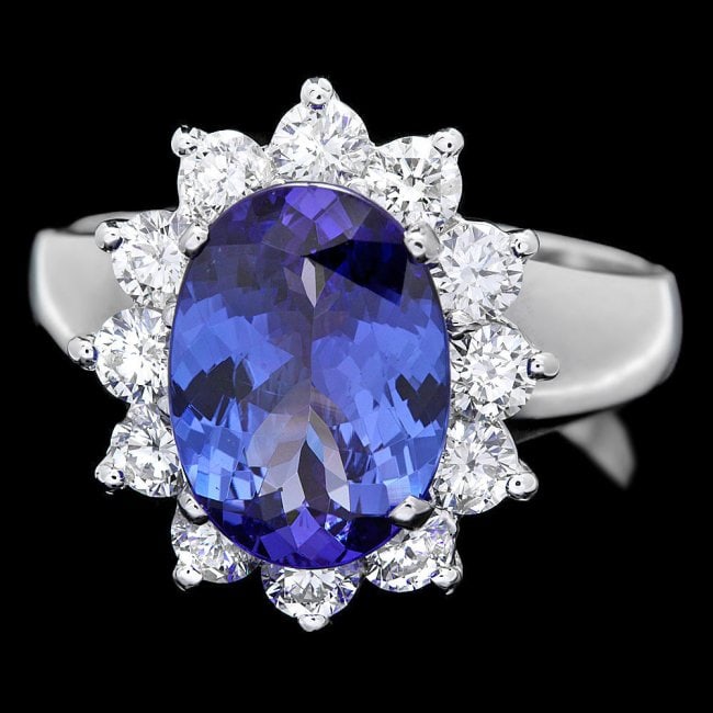 14k Gold 3.00ct Tanzanite 1.00ct Diamond Ring: Retail: $9,800.00 ****** 14k Gold 3.00ct Tanzanite 1.00ct Diamond Ring ****** Metal: 14k Solid White Gold / Size: 7 / Total Item Weight: 5.5 grams / Country Made: United States / / Main Stone: Tanzani
