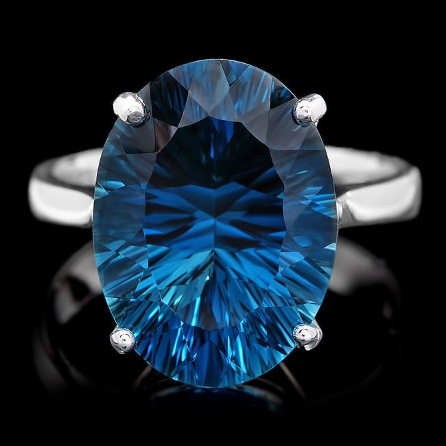 14k White Gold 10.00ct Topaz Ring: Retail: $2,500.00 ****** 14k White Gold 10.00ct Topaz Ring ****** Metal: 14k Solid White Gold / Size: 7 / Total Item Weight: 6.0 grams / Country Made: United States / / Main Stone: Topaz / Color: Blue