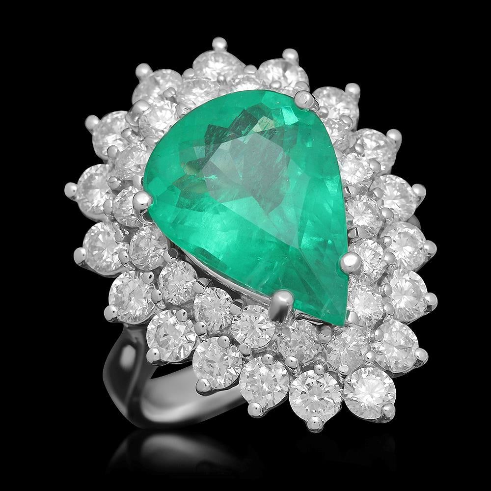14K Gold 4.89 Emerald 2.65 Diamond Ring: Retail: $19,770.00 ******14K Gold 4.89 Emerald 2.65 Diamond Ring****** Metal: 14K Solid Gold / Total Item Weight: 9.3 grams / Country Made: United States / / Main Stone: Emerald / Color: Green / Carat