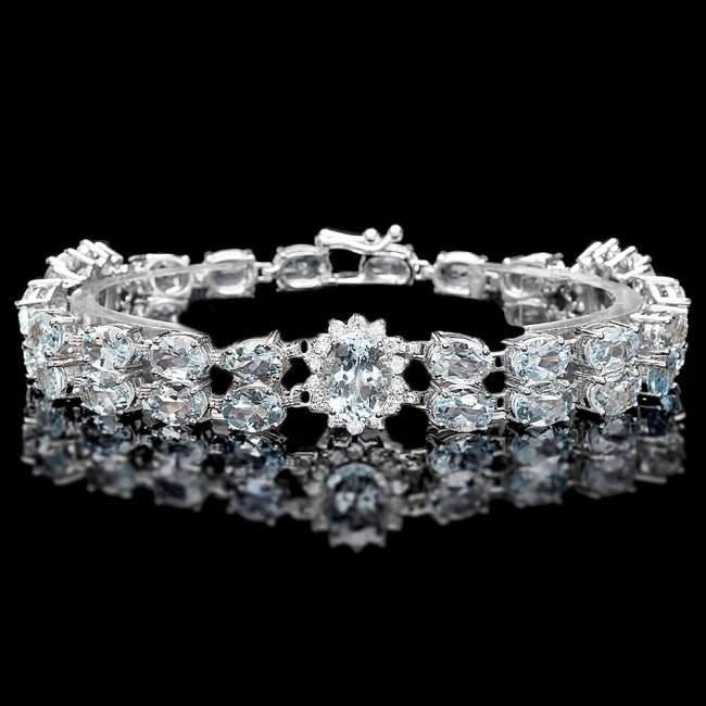 14k Gold 26ct Aquamarine 1.50ct Diamond Bracelet: Retail: $18,700.00 ****** 14k Gold 26ct Aquamarine 1.50ct Diamond Bracelet ****** Metal: 14k Solid White Gold / Size: 7.5 / Total Item Weight: 24.5 grams / Country Made: United States / / Main Stone: 