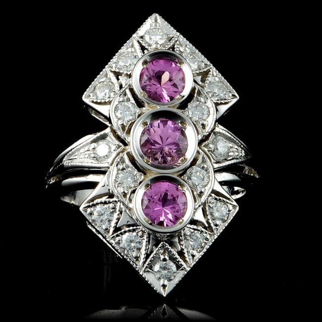 14k Gold 2.00ct Sapphire 0.70ct Diamond Ring: Retail: $4,700.00 ****** 14k Gold 2.00ct Sapphire 0.70ct Diamond Ring ****** Metal: 14k Solid White Gold / Total Item Weight: 7.8 grams / / Main Stone: Sapphire / Color: Pink / Carat Total Weight: 2.0