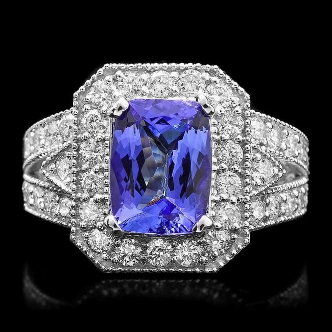 14k Gold 3.00ct Tanzanite 1.50ct Diamond Ring: Retail: $11,200.00 ****** 14k Gold 3.00ct Tanzanite 1.50ct Diamond Ring ****** Metal: 14k Solid White Gold / Size: 7 / Total Item Weight: 7.9 grams / Country Made: United States / / Main Stone: Tanzan