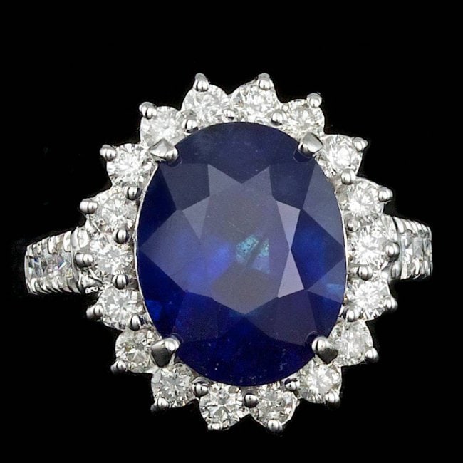 14k Gold 8.00ct Sapphire 1.20ct Diamond Ring: Retail: $11,700.00 ****** 14k Gold 8.00ct Sapphire 1.20ct Diamond Ring ****** Metal: 14k Solid White Gold / Size: 6.75 / Total Item Weight: 7.5 grams / Country Made: United States / / Main Stone: Sapp
