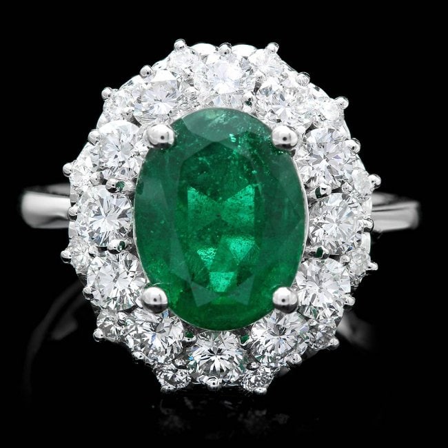 14k White Gold 3.20ct Emerald 1.80ct Diamond Ring: Retail: $23,750.00 ****** 14k White Gold 3.20ct Emerald 1.80ct Diamond Ring ****** Metal: 14k Solid White Gold / Size: 7.75 / Total Item Weight: 6.5 grams / Country Made: United States / / Main Stone: